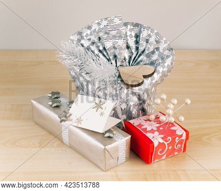 Red And Silver Paper Wrap Gift Box Gray Bow Present Christmas Birthday Isolated Background.