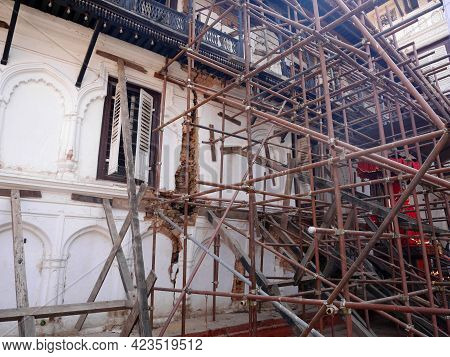 Nepalese Worker People Renovate Repair Build Scaffolding Structure At Ancient Ruins Antique Building