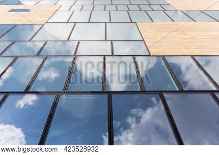 Groningen, Netherlands - March 07, 2020: Blue Sky Reflected In The Windows Of The Forum In Groningen