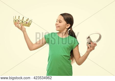 Queen Of Music. Portrait Of Cheerful Girl Isolated On White. Happy Childhood. Small Girl Choose Betw