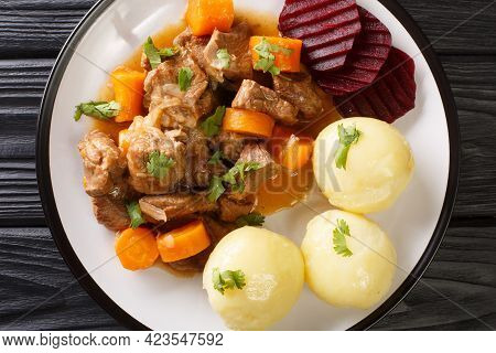Swedish Beef Stew Kalops Slow Simmered With Vegetables Close Up In The Plate On The Table. Horizonta