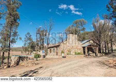 Seweweekspoort, South Africa - April 6, 2021: Hall And Swimming Pool At Op Die Plaas Camping Site At