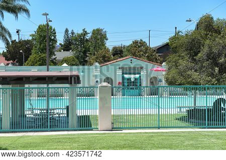 BREA, CALIFORNIA - 9 JUN 2021: The Plunge, a public swimming pool in City Hall Park. 