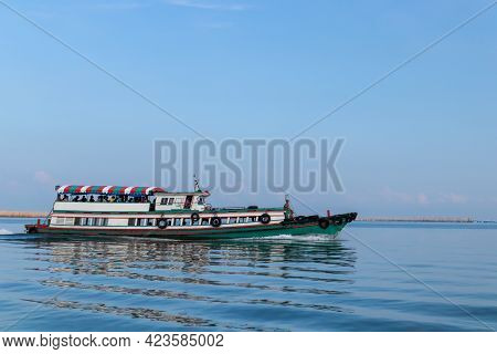 Passenger Ships Sailing On The Blue Sea During The Summer Daytime.