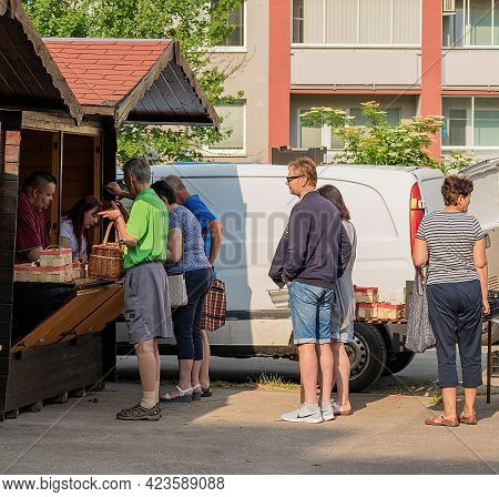 Hodonin, Czech Republic, June 12, 2021 Customers And Sellers In Hodonin At A Local Small Agricultura
