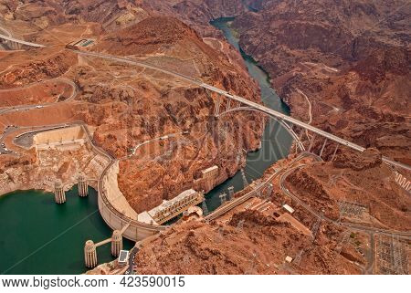 Aerial View Of Hoover Dam With Mike O'callaghan-pat Tillman Memorial Bridge On Us 93 Freeway