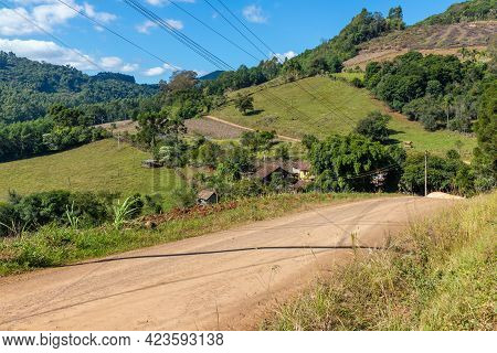 Dirty Road, Farm Field With Small House And Wood Shed In A Valley, Pinhal Alto, Nova Petropolis, Rio