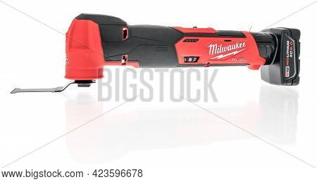 Winneconne, Wi - 10 June 2021:  A Package Of Milwaukee Oscillating Tool Battery M12 On An Isolated B