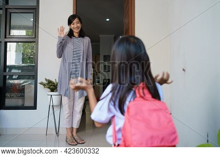 Back To School. Asian Pupil With Primary Student Uniform Getting Ready To School