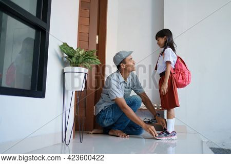 Back To School. Asian Pupil With Primary Student Uniform Getting Ready To School