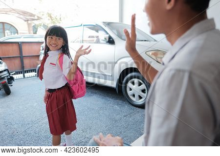 Back To School. Asian Pupil With Primary Student Uniform Getting Ready To School