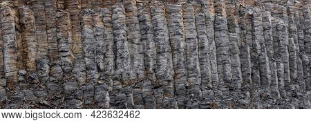 Panoramic view of tall basalt columns in Iceland