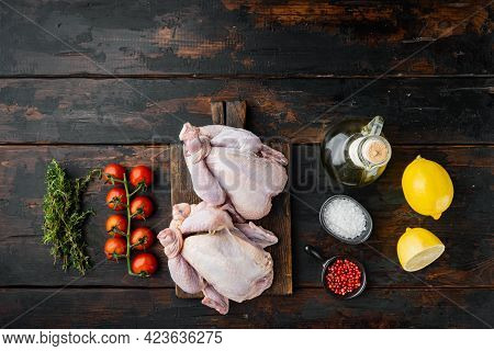 Raw Coquelet Chickens Meat With  Ingredients, On Old Wooden Table, Top View With Copy Space For Text
