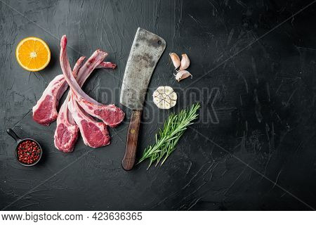 Fresh Lamb Cutlet. Organic Meat Steak Set, With Ingredients Carrot Orange, Herbs, On Black Stone Bac