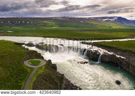 Aerial View Of The Godafoss Waterfall In Iceland With Viewing Area For Tourists