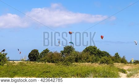 Lots Of Kite Surfing Activity At The Baltic Sea Beach Of Laboe In Germany On A Sunny Day