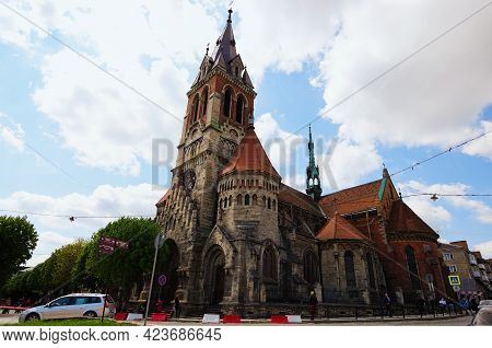 Chortkiv, Ukraine-may 12, 2021:astonishin Landscape View Of Gothic Saint Stanislaus Cathedral. Blue 