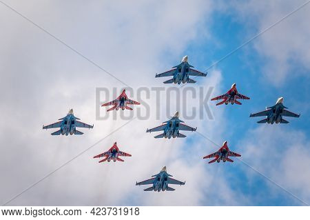 Moscow, Russia - May, 05, 2021: Diamond-shape Of 4 Mig-29 The Russian Knights And 5 Su-27 Swifts In 