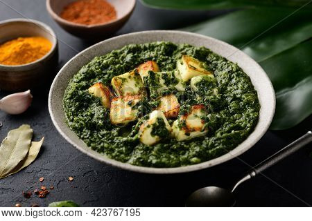 Palak Paneer Indian Traditional Food With Cheese And Spinach On Black Background, Selective Focus