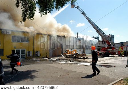 Fire Department Emergency Response With A Turntable Ladder
