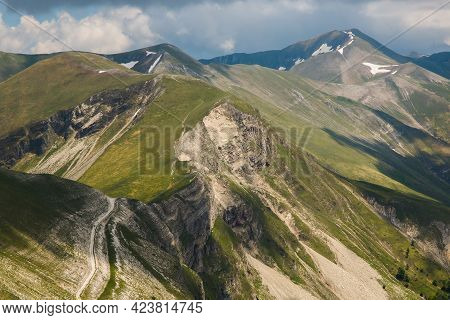 Panoramic View From Monte Bove Sud During Cloudy Spring Day In The National Park Of Monti Sibillini,