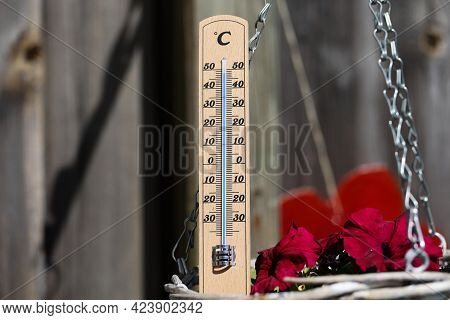 Thermometer Shows High Temperatures On A Hot Summer Day