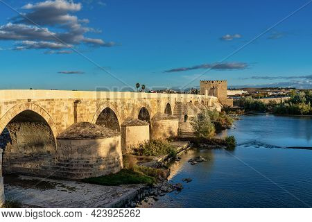 Roman Bridge, Across Guadalquivir River With Torre De Calahorra, Calahorra Tower In Cordoba, Andalus