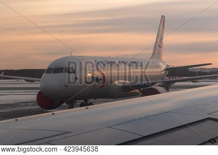 Yekaterinburg. Russia. 12/20/2020. The View From The Airplane Window Of The Runway And Part Of The S