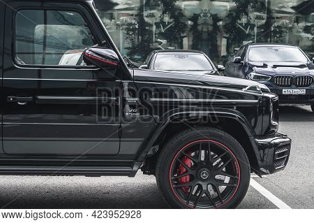 Moscow, Russia - June 2021: Luxury Black Suv Mercedes-benz G Class Gelandewagen Parked Next To Mosco