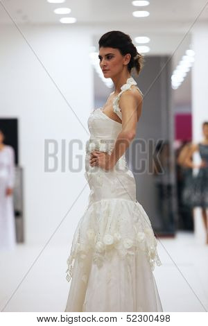 ZAGREB, CROATIA - OCTOBER 12: Fashion model in wedding dress made by Lorien on 'Wedding Expo' show in the Westgate Shopping City in Zagreb, Croatia on October 12, 2013