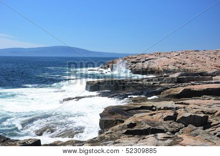 Crashing Waves Against The Rock