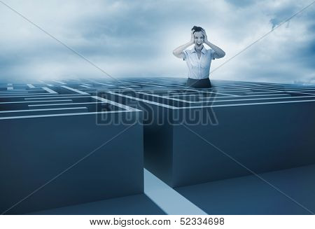 Businesswoman screaming and getting lost in a maze with dark sky on the background