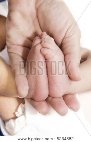 AdultÂ´s Hand And BabyÂ´s Foot