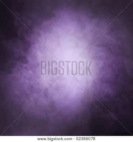 Abstract texture of the purple smoke over black background