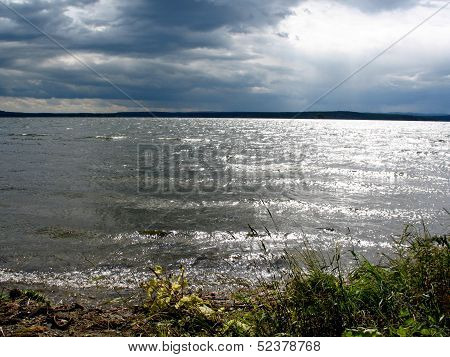 Lake, Cloudy Sky And Bank