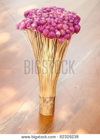 Globe amaranth flower and bamboo decoration