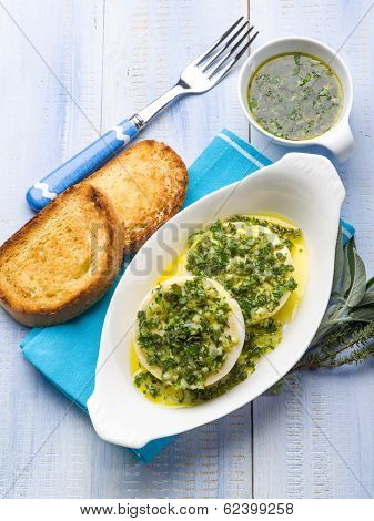 marinated tomino cheese with herbs