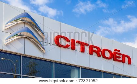 Samara, Russia - September 21, 2014: Citroen Dealership Sign Against Blue Sky.  Citroen Is A Major F