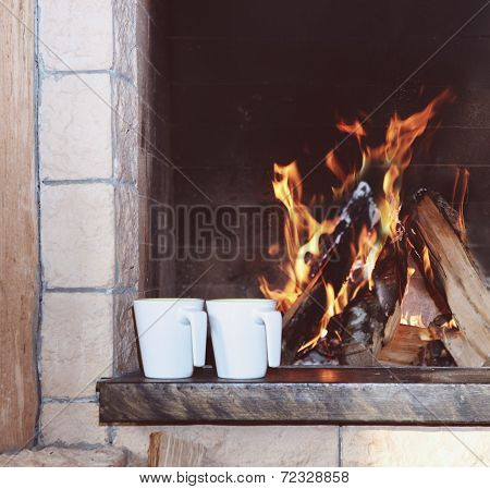 Two Mugs Near The Fireplace
