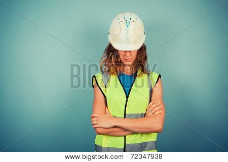 Young Female Engineer In High Vis And Hardhat