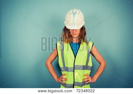 Young Female Engineer In High Vis And Hardhat