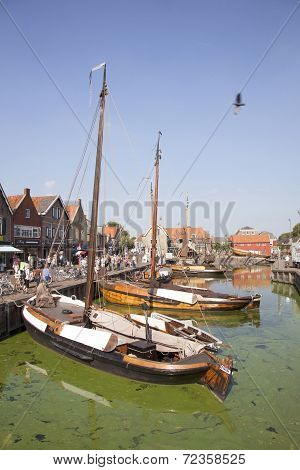 Old Dutch Sailing Vessels In The Harbor Of Spakenburg