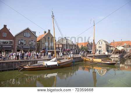 Old Dutch Sailing Vessels In The Harbor Of Spakenburg