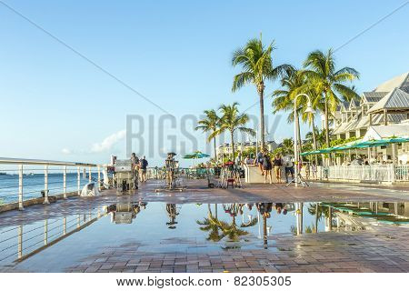 People Enjoy The Sunset Point At Mallory Square In Key Wes