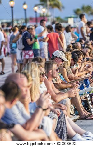 People Enjoy The Sunset Point At Mallory Square In Key Wes