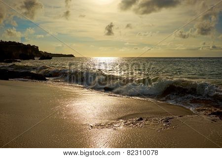 Amazing  beach destination sunrise or sunset with beautiful breaking waves 
