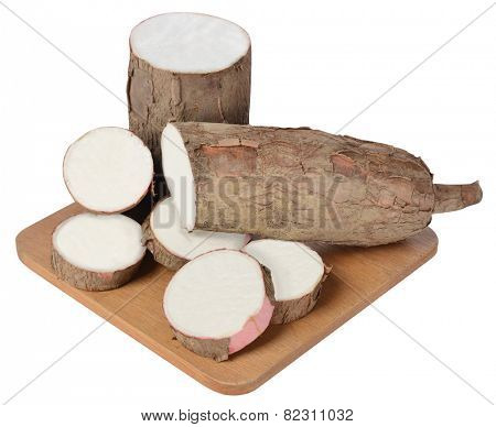 Raw yuca isolated against white background.
