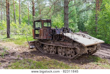 Old Skidder At The Forest In Summertime
