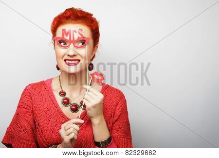 Attractive playful young woman ready for party - falce lips and glasses   