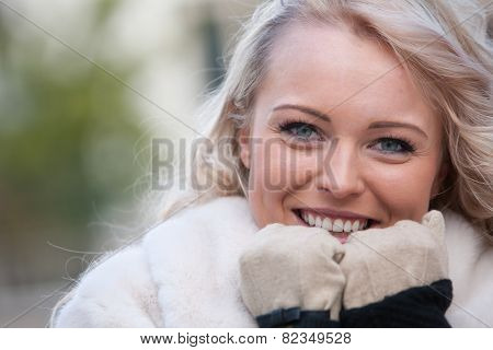 Beautiful Woman Smiling With Gloves
